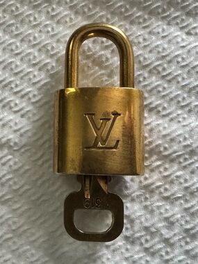 Louis Vuitton Gold LV Engraved Padlock with Key 319